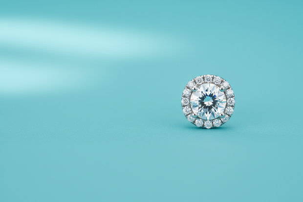 stud earring on the right side, with bright blue background like Tiffany's co